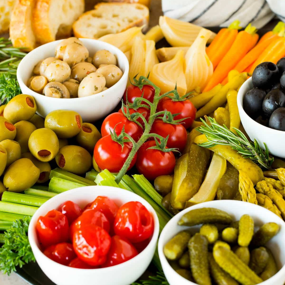 Curated antipasti, olives, and pickled vegetables